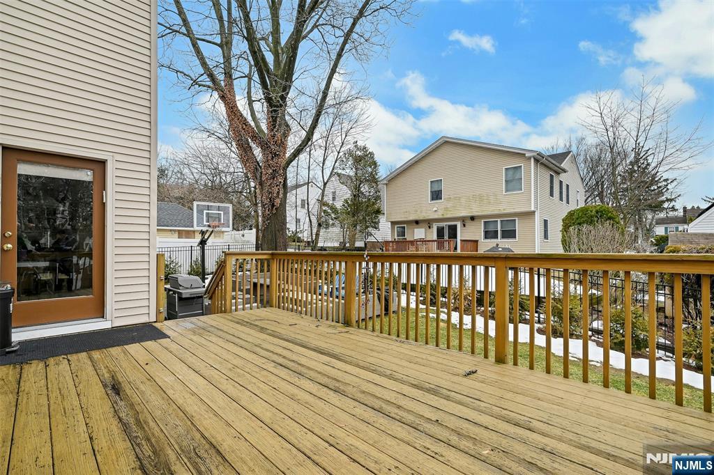 288 Schley Place Teaneck, NJ 07666 - Photo 23 of 29 a view of a house with wooden deck