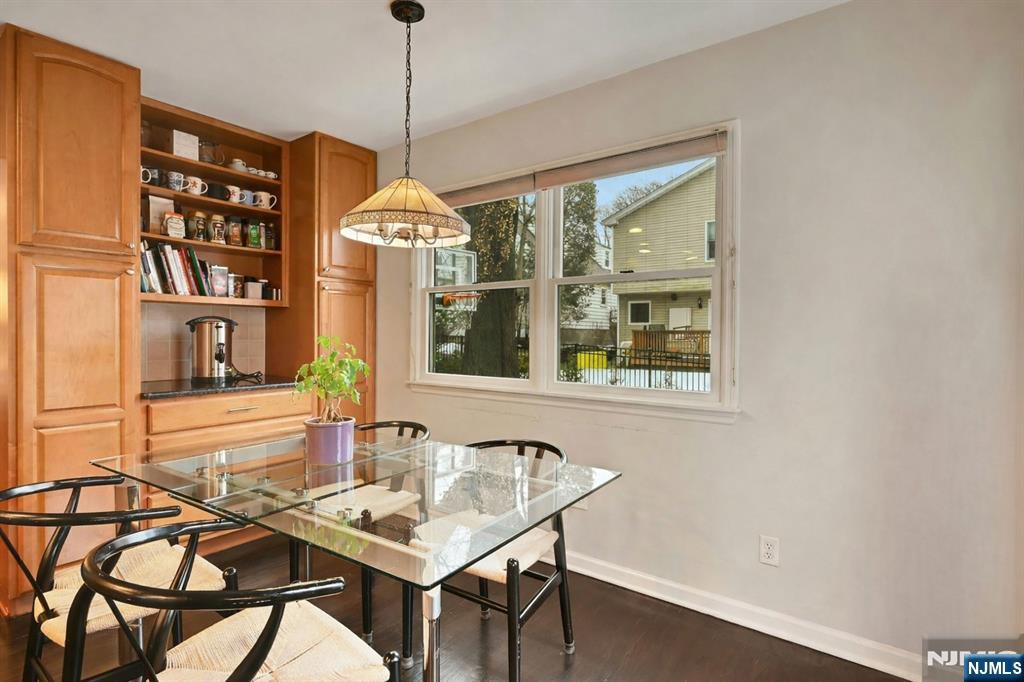 288 Schley Place Teaneck, NJ 07666 - Photo 6 of 29 a dining room with a table and chairs