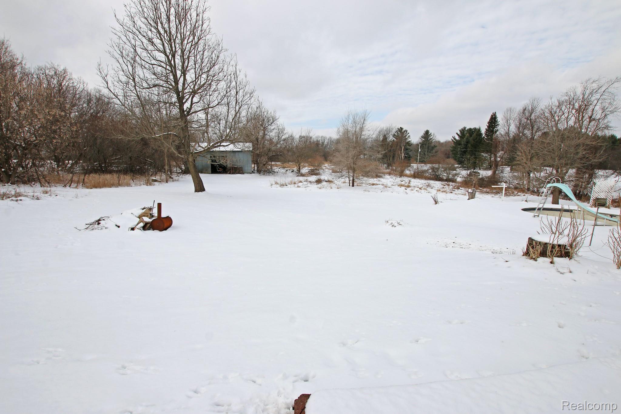 4725 Secord Lake Road Leonard, MI 48367 - Photo 41 of 53 50) Backyard.jpg