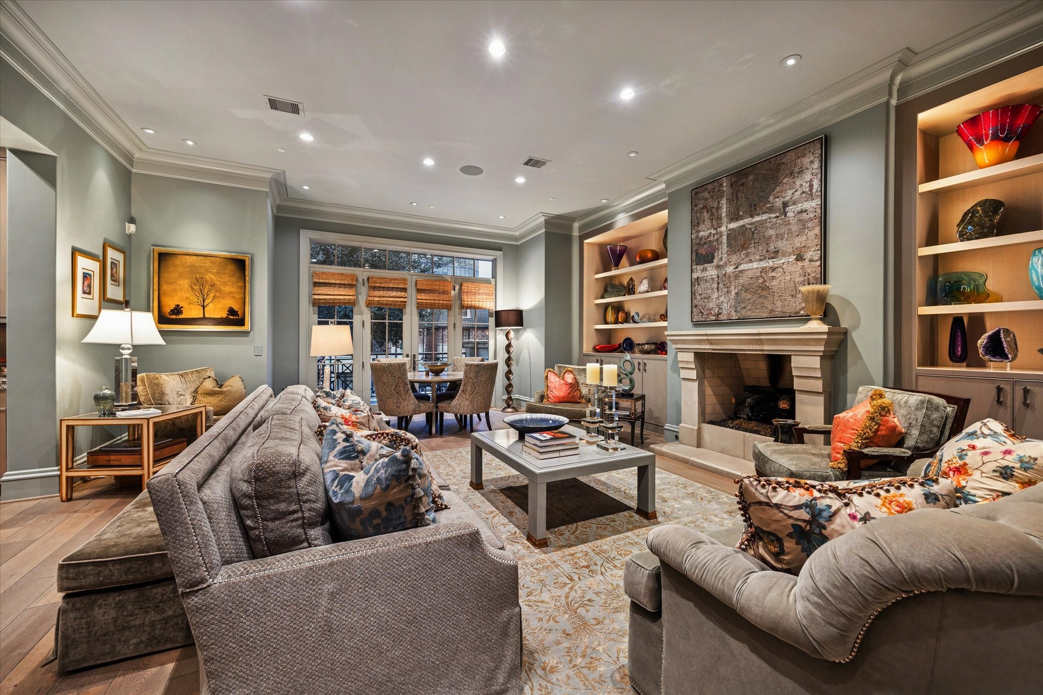 1225 Place Royale Way Houston, TX 77056 - Photo 13 of 45 a living room with furniture fireplace and a flat screen tv