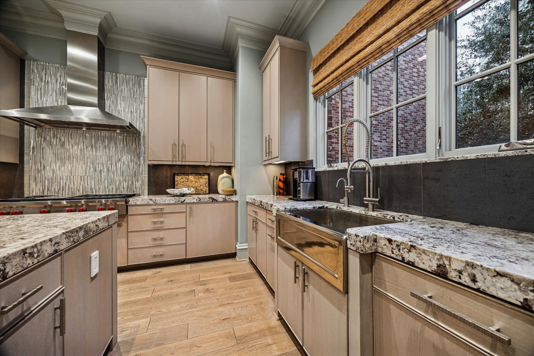 1225 Place Royale Way Houston, TX 77056 - Photo 21 of 45 a kitchen with stainless steel appliances granite countertop a stove a sink and a microwave