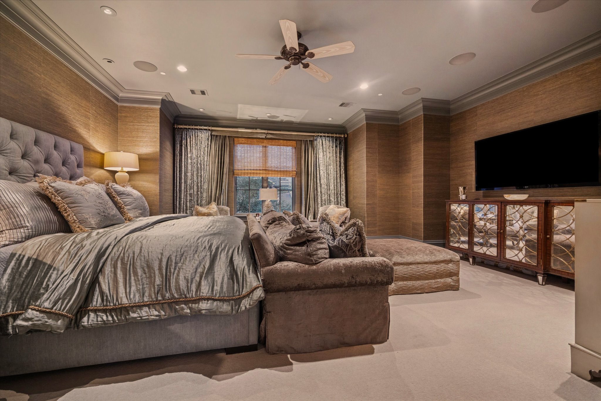 1225 Place Royale Way Houston, TX 77056 - Photo 28 of 45 a spacious bedroom with a bed and a flat screen television