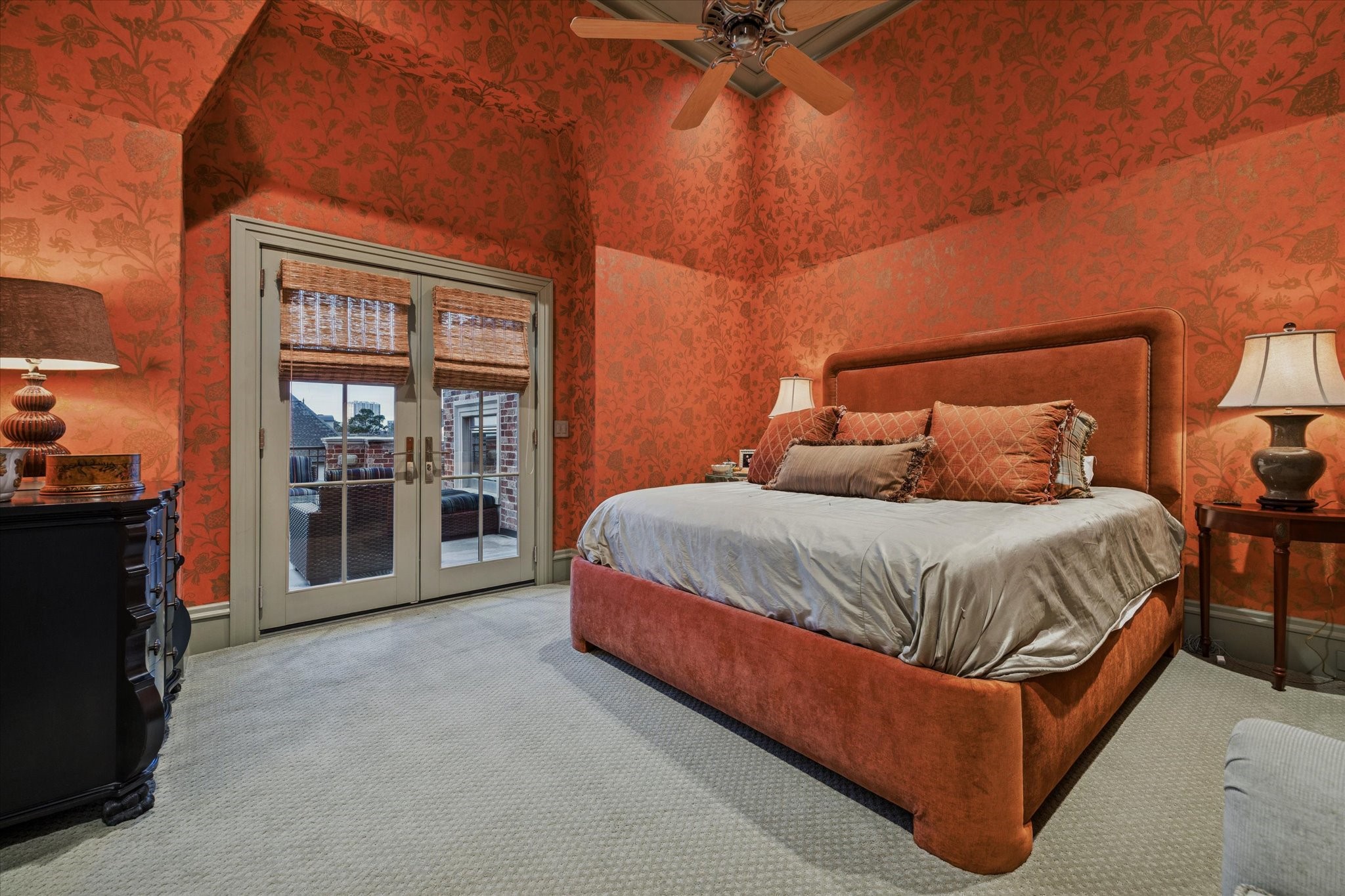 1225 Place Royale Way Houston, TX 77056 - Photo 36 of 45 a spacious bedroom with a bed and a chandelier