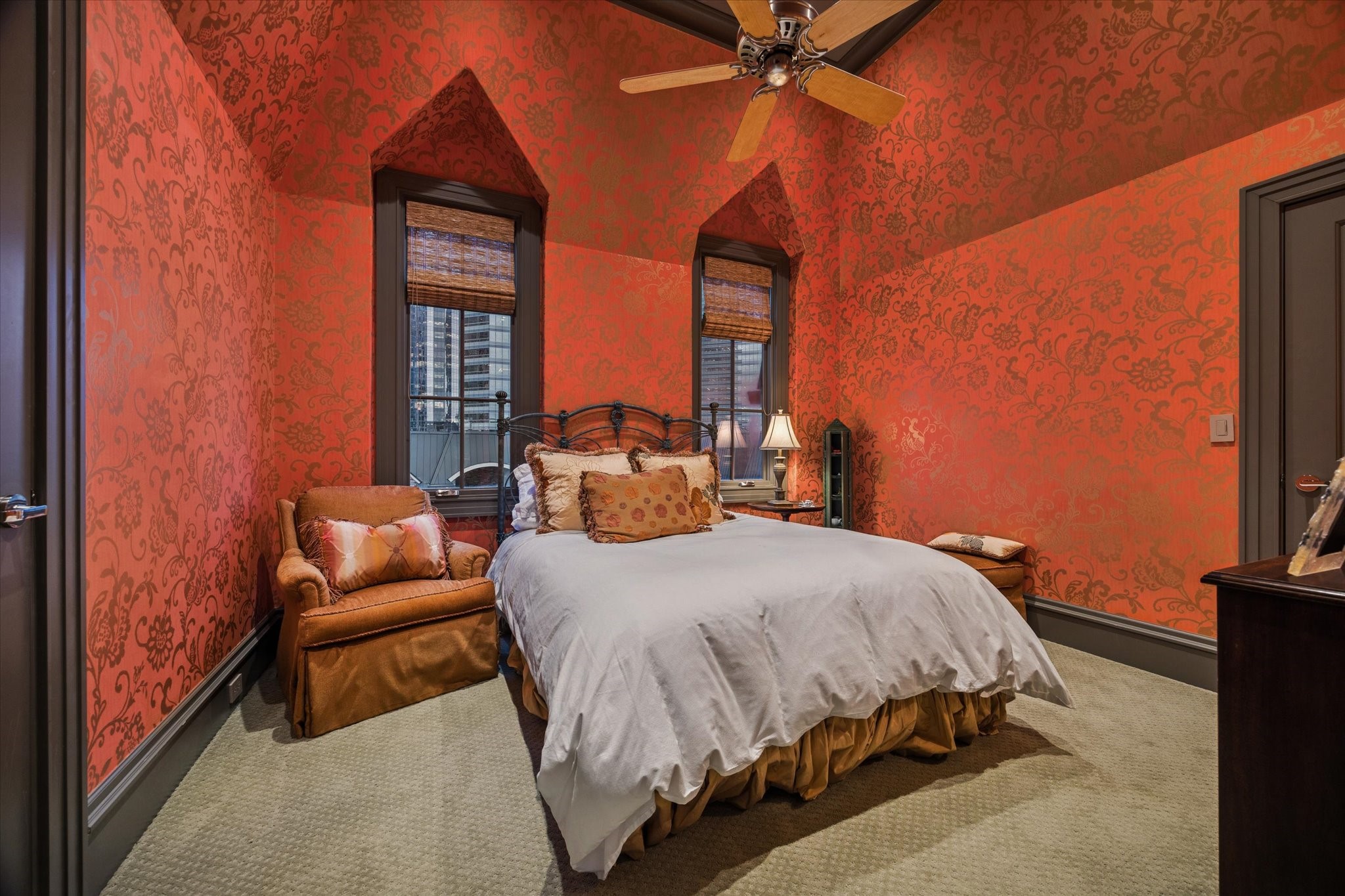 1225 Place Royale Way Houston, TX 77056 - Photo 37 of 45 a bedroom with a bed and a chandelier