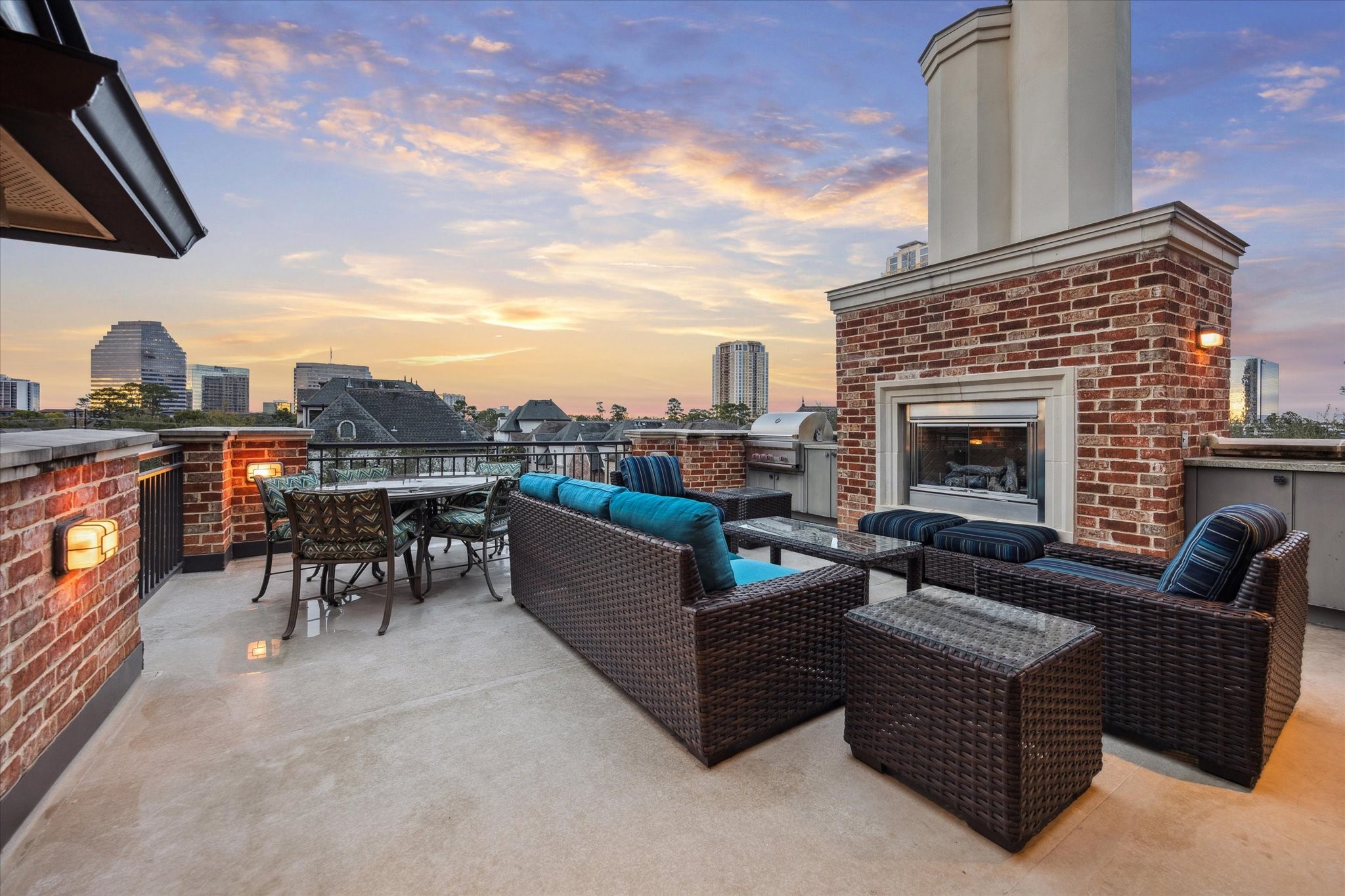 1225 Place Royale Way Houston, TX 77056 - Photo 39 of 45 a living room with furniture a fireplace and a flat screen tv