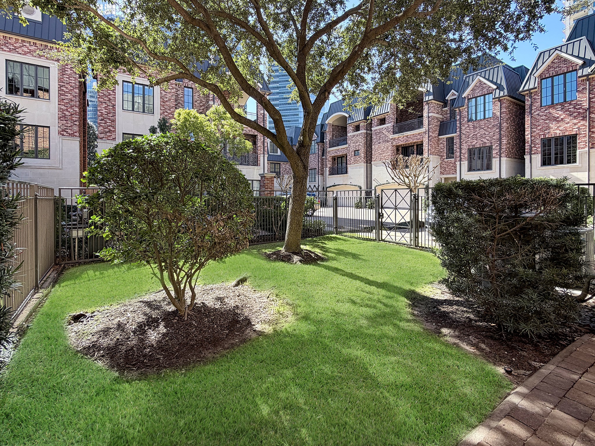 1225 Place Royale Way Houston, TX 77056 - Photo 42 of 45 a front view of a house with a yard