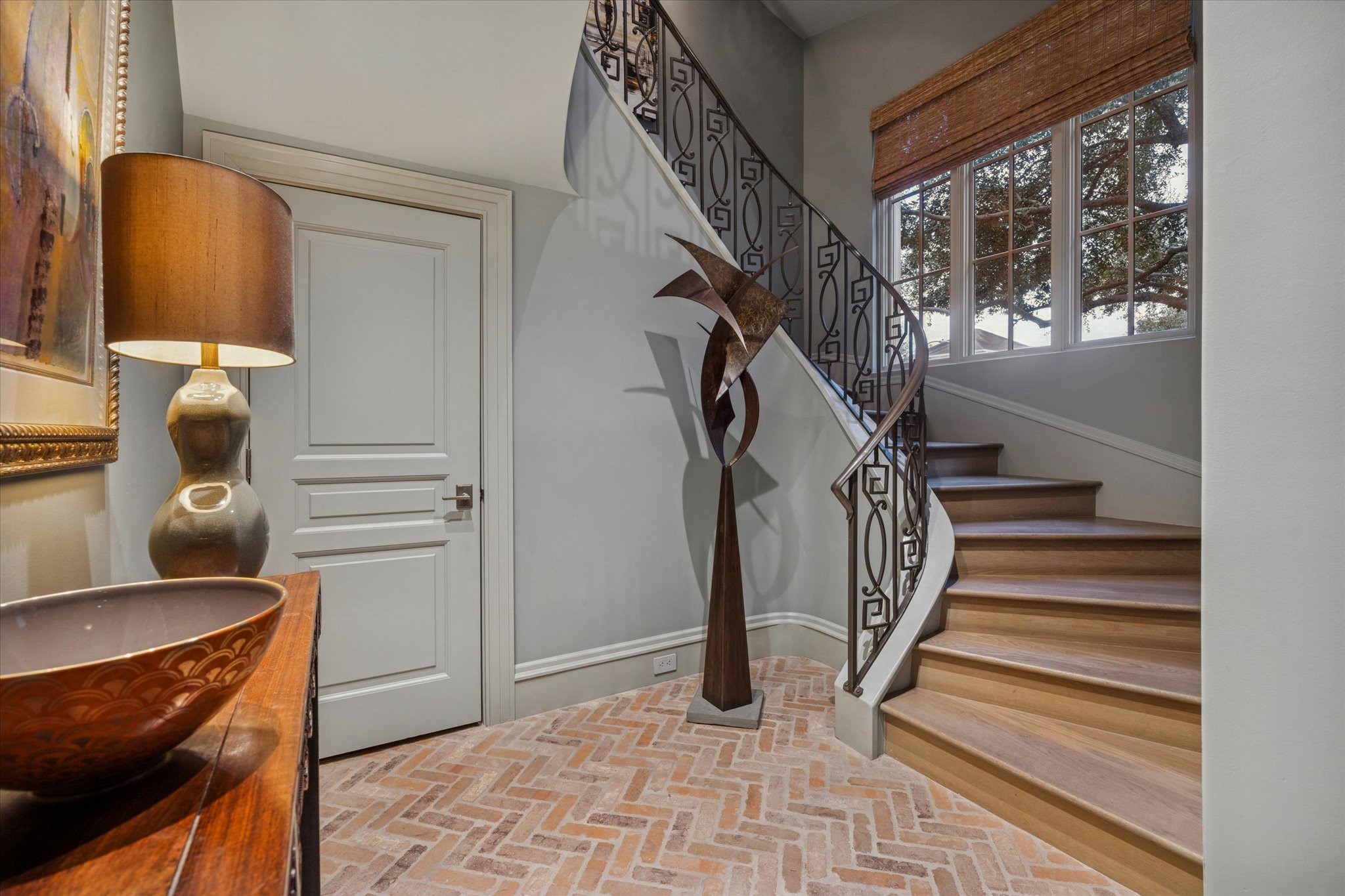 1225 Place Royale Way Houston, TX 77056 - Photo 6 of 45 a view of entryway and hall with wooden floor