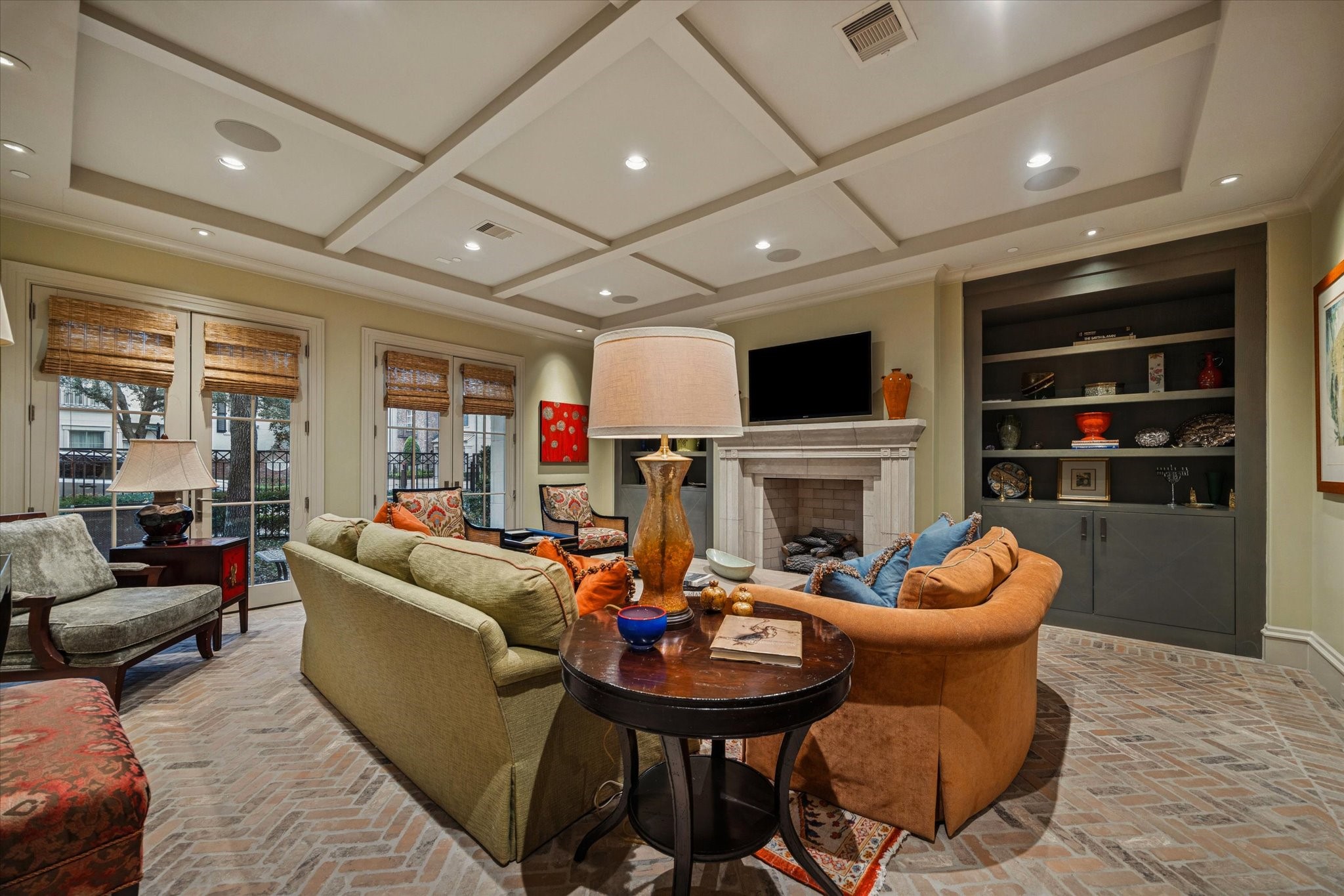 1225 Place Royale Way Houston, TX 77056 - Photo 7 of 45 a living room with furniture a fireplace and a flat screen tv