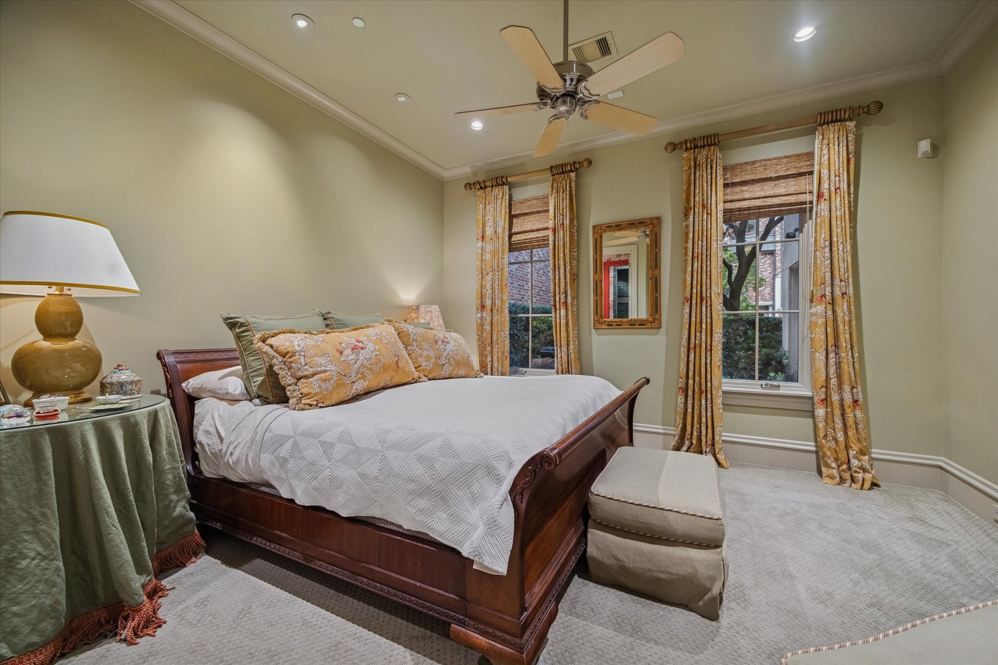1225 Place Royale Way Houston, TX 77056 - Photo 10 of 45 a bedroom with a bed and a chandelier