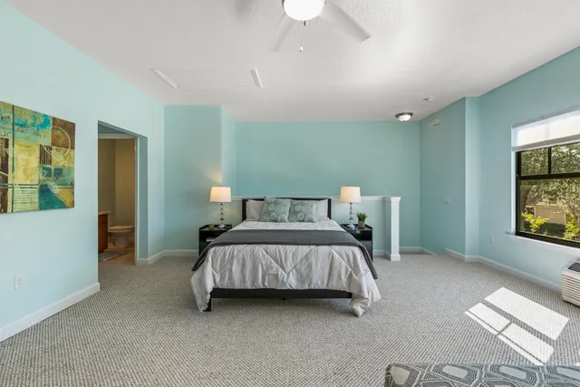 a kitchen with granite countertop wooden cabinets and a refrigerator stove top oven