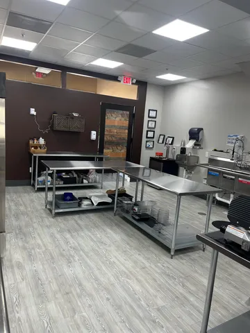 a view of a swimming pool with an outdoor space and seating area