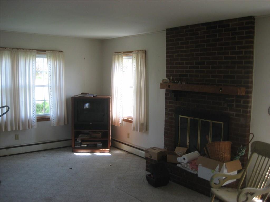 683 Spruce Head Road South Thomaston, ME 04858 - Photo 10 of 21 Family room with fireplace