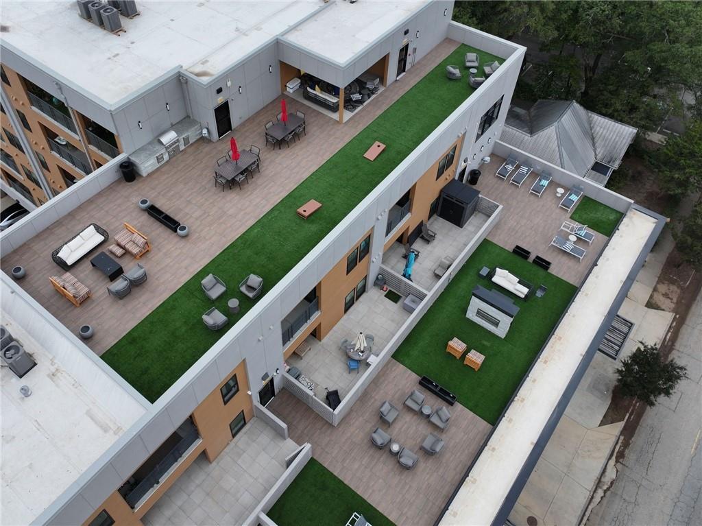 112 Rogers Street Northeast, Unit 202 Atlanta, GA 30317 - Photo 23 of 36 a aerial view of a house with a garden
