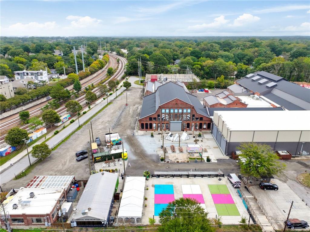 112 Rogers Street Northeast, Unit 202 Atlanta, GA 30317 - Photo 32 of 36 an aerial view of multiple houses with yard
