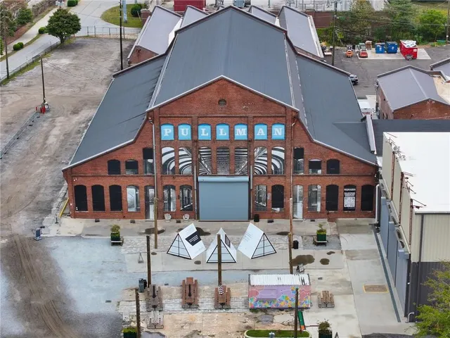 a front view of a building with many windows