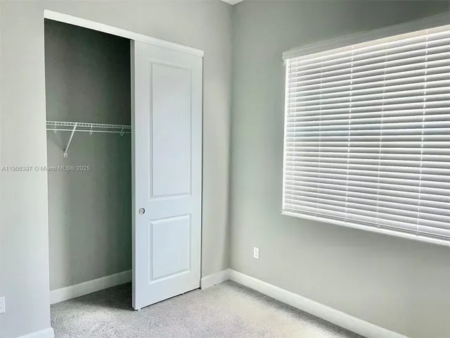 an empty room with a natural light