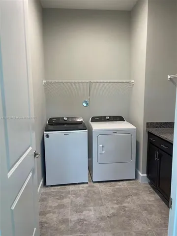 a view of a hallway with windows