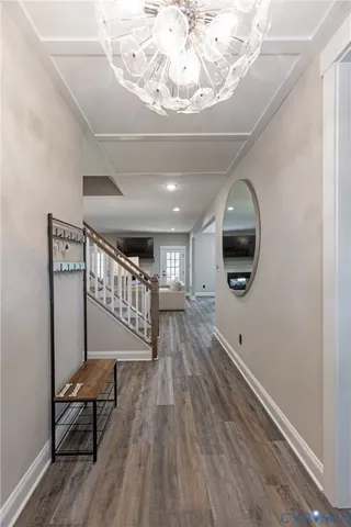 a view of entryway with wooden floor