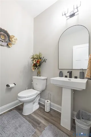 a kitchen with a refrigerator and sink