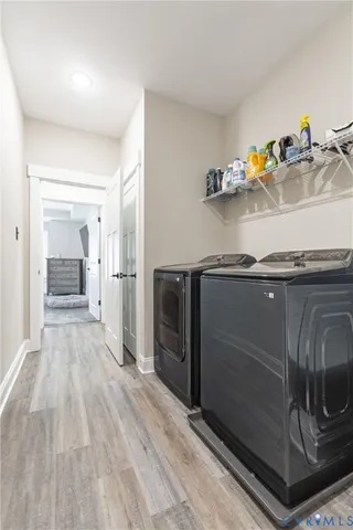 a bathroom with a sink toilet and a mirror