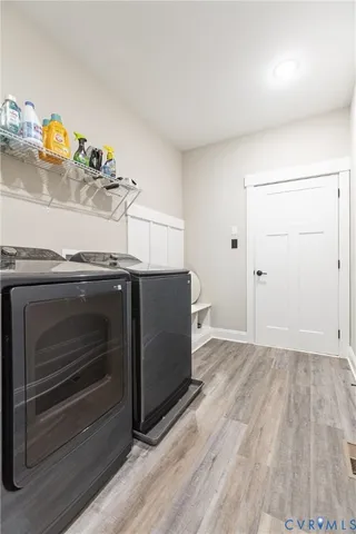 a kitchen with a sink and refrigerator
