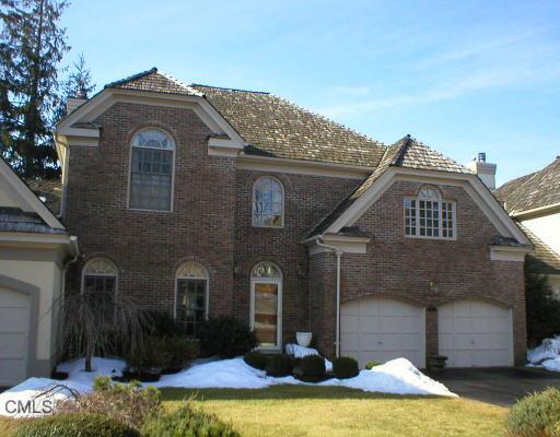 122 Stillson Road Fairfield, CT 06825 - Photo 1 of 1 a front view of a house with a yard
