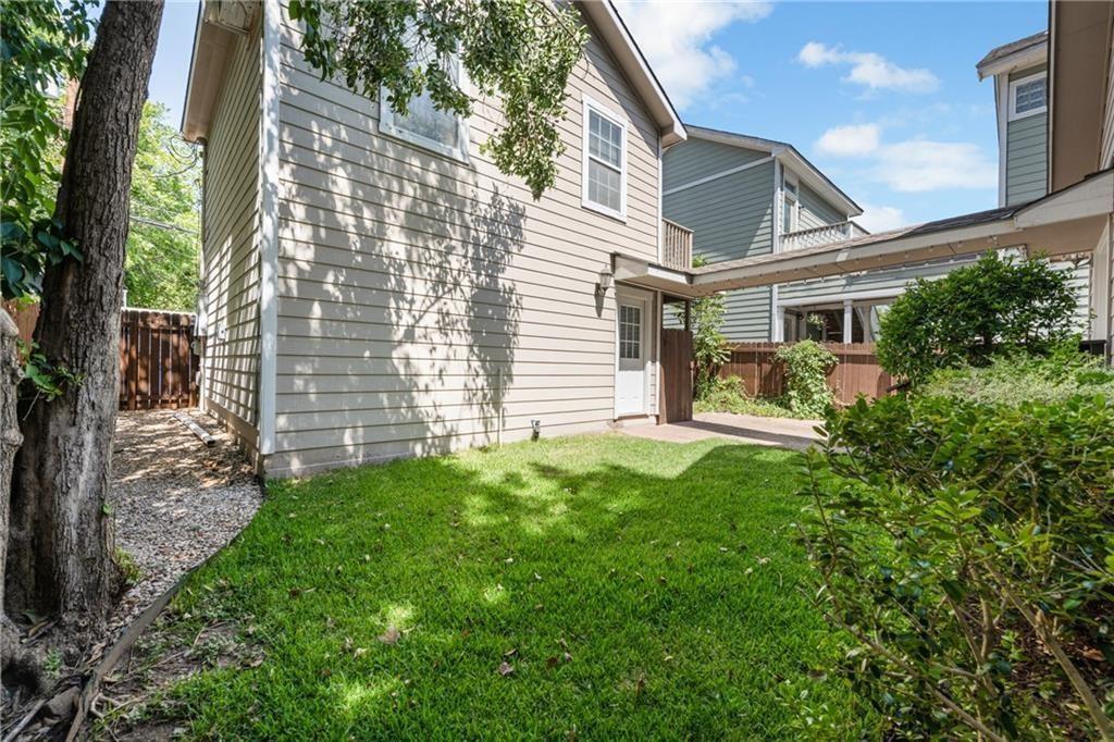 714 East 45th Street Austin, TX 78751 - Photo 19 of 26 a view of a house with a yard