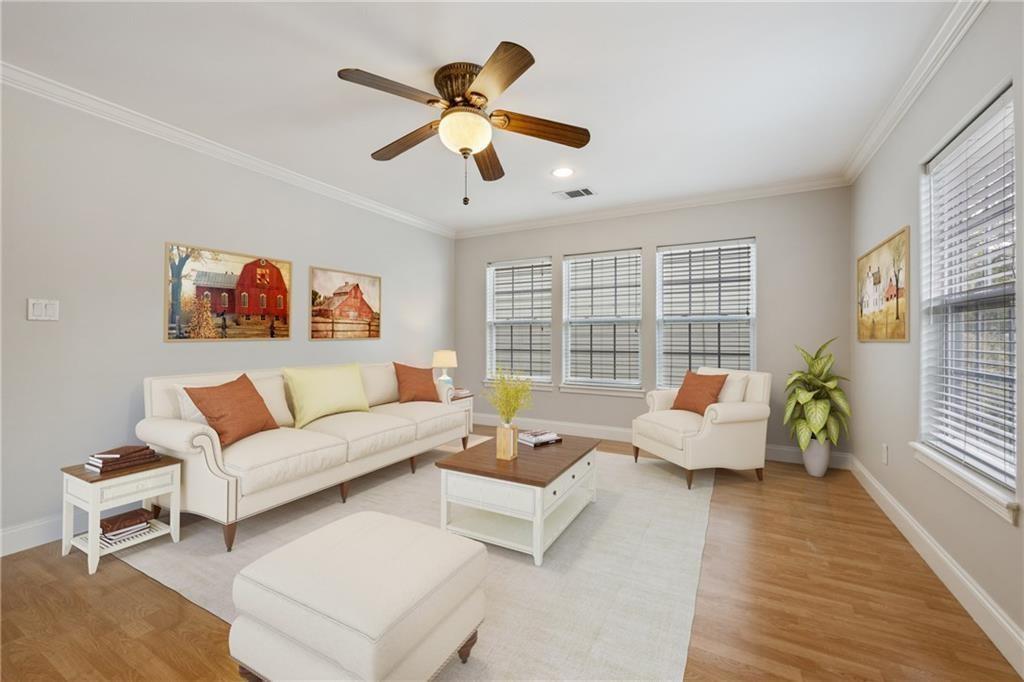 714 East 45th Street Austin, TX 78751 - Photo 2 of 26 a living room with furniture and a large window