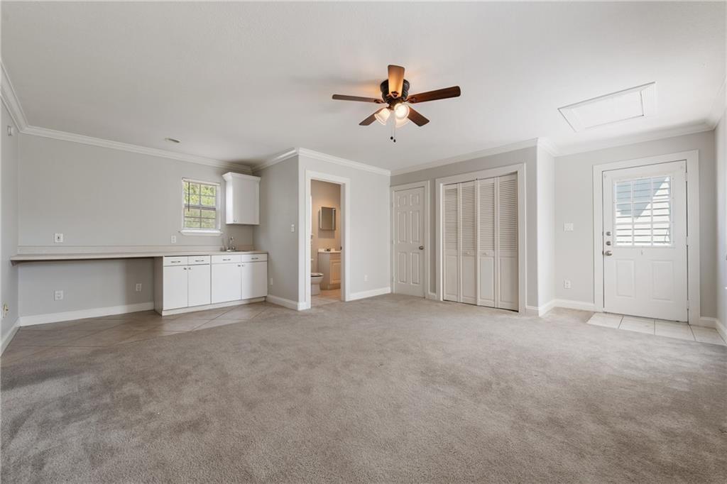 714 East 45th Street Austin, TX 78751 - Photo 22 of 26 a view of empty room with window and ceiling fan