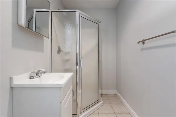 a bathroom with a sink and mirror