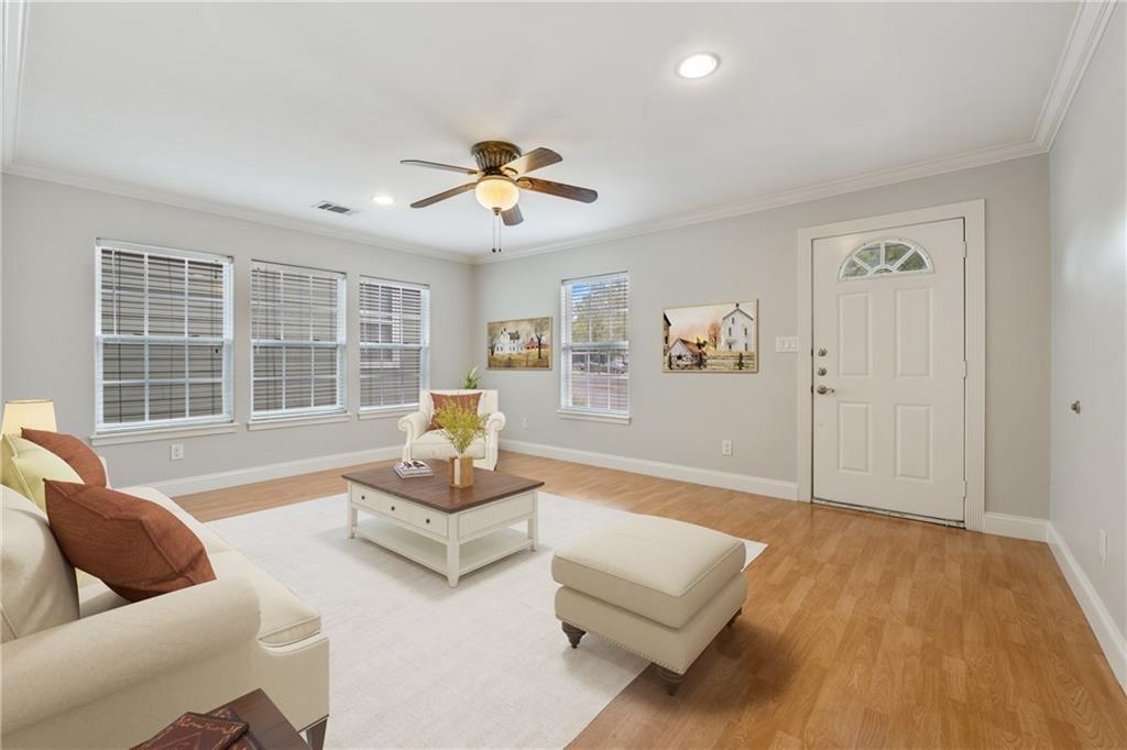 714 East 45th Street Austin, TX 78751 - Photo 3 of 26 a living room with furniture and a large window