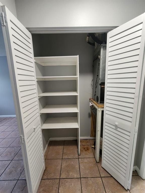 101 North Fernwood Avenue, Unit 6 Clearwater, FL 33765 - Photo 11 of 12 a view of walk in closet with empty racks
