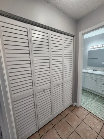 a view of a room that has a window in it