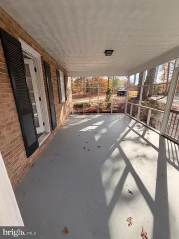 a view of a livingroom with wooden floor