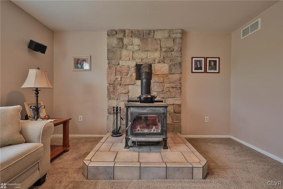 124 Belfast Road Nazareth, PA 18064 - Photo 15 of 35 a living room with furniture and a fireplace