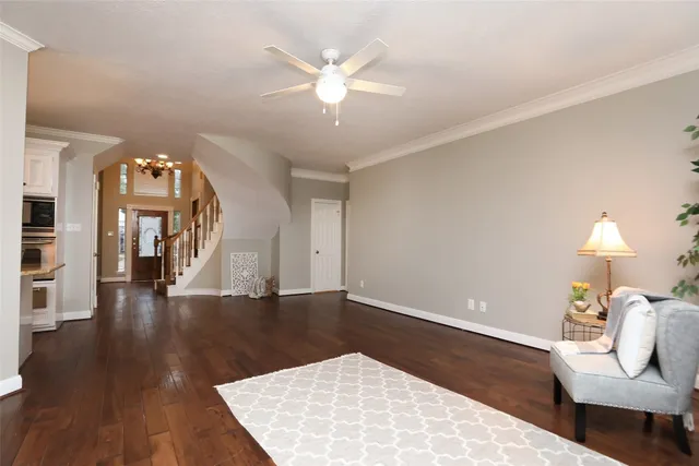 a view of a livingroom with wooden floor