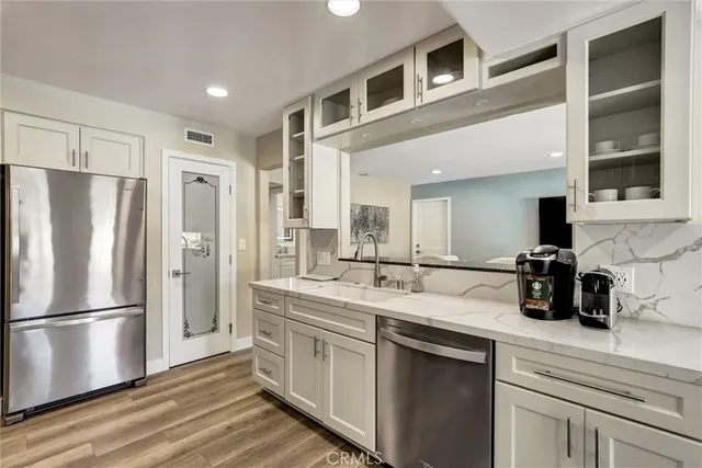 a view of a livingroom with furniture and windows