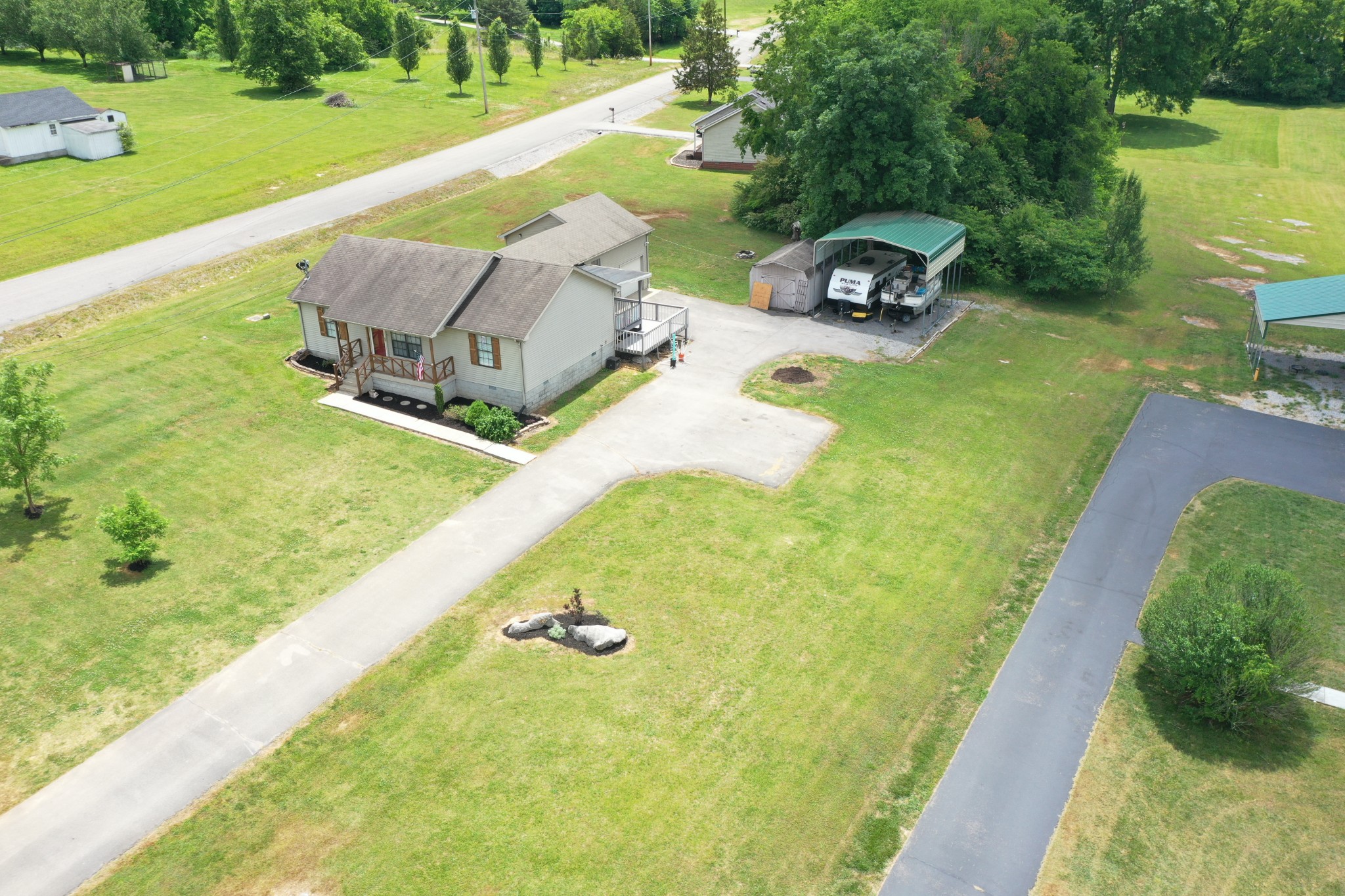 794 Chicken Road Lebanon, TN 37090 - Photo 1 of 25 a swimming pool view with a garden space