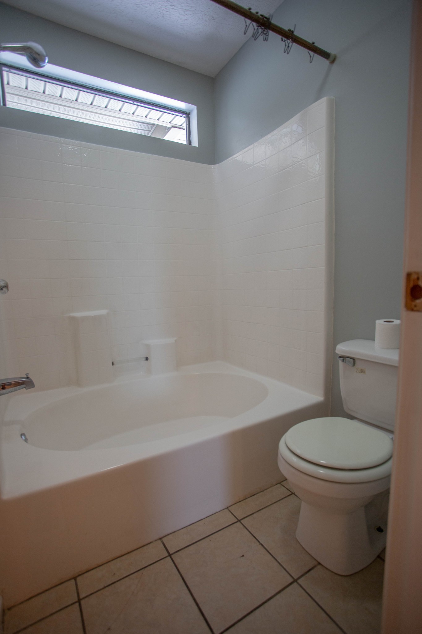 794 Chicken Road Lebanon, TN 37090 - Photo 15 of 25 a white toilet sitting next to a bath tub