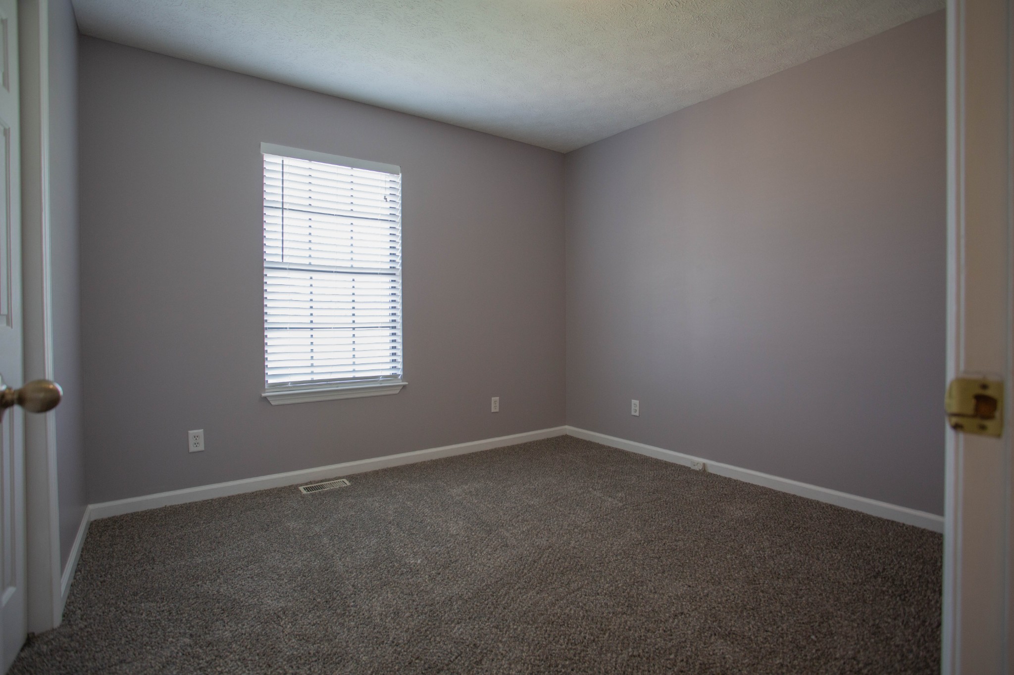 794 Chicken Road Lebanon, TN 37090 - Photo 16 of 25 an empty room with a window