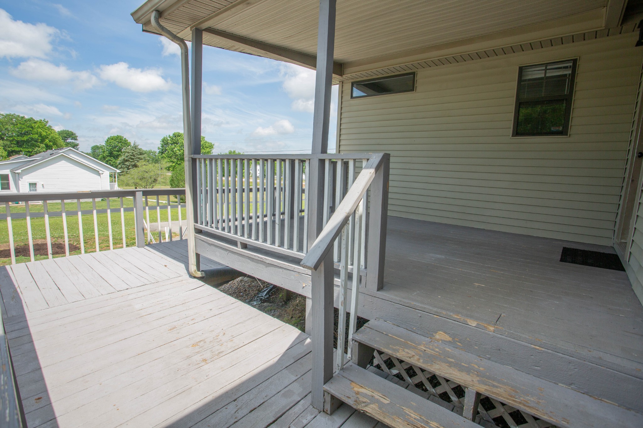 794 Chicken Road Lebanon, TN 37090 - Photo 22 of 25 a view of a balcony with wooden floor