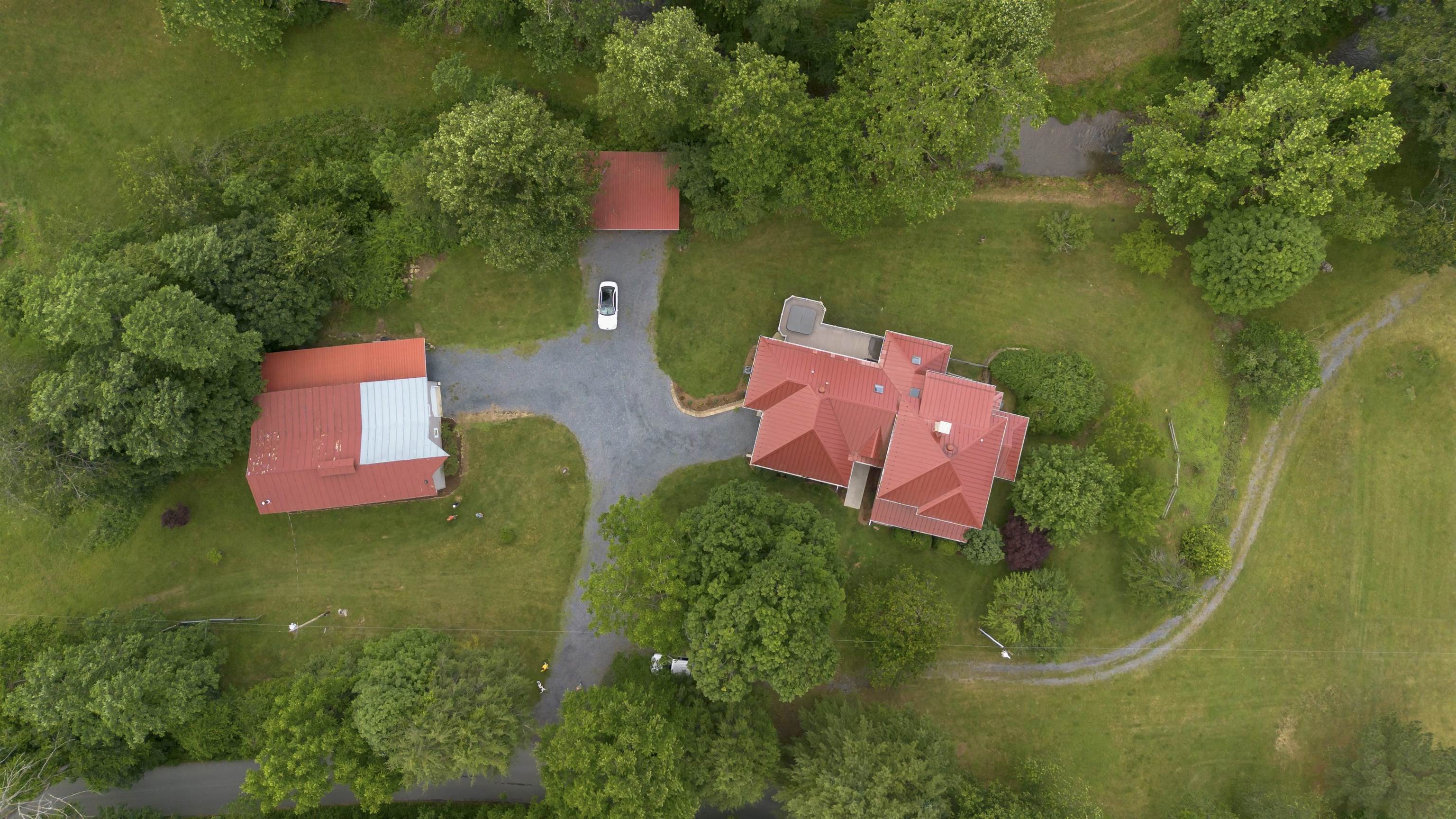 7304 Dry Run Road Williamsville, VA 24487 - Photo 55 of 57 an aerial view of a house with a yard basket ball court and outdoor seating