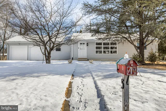 a front view of a house with street