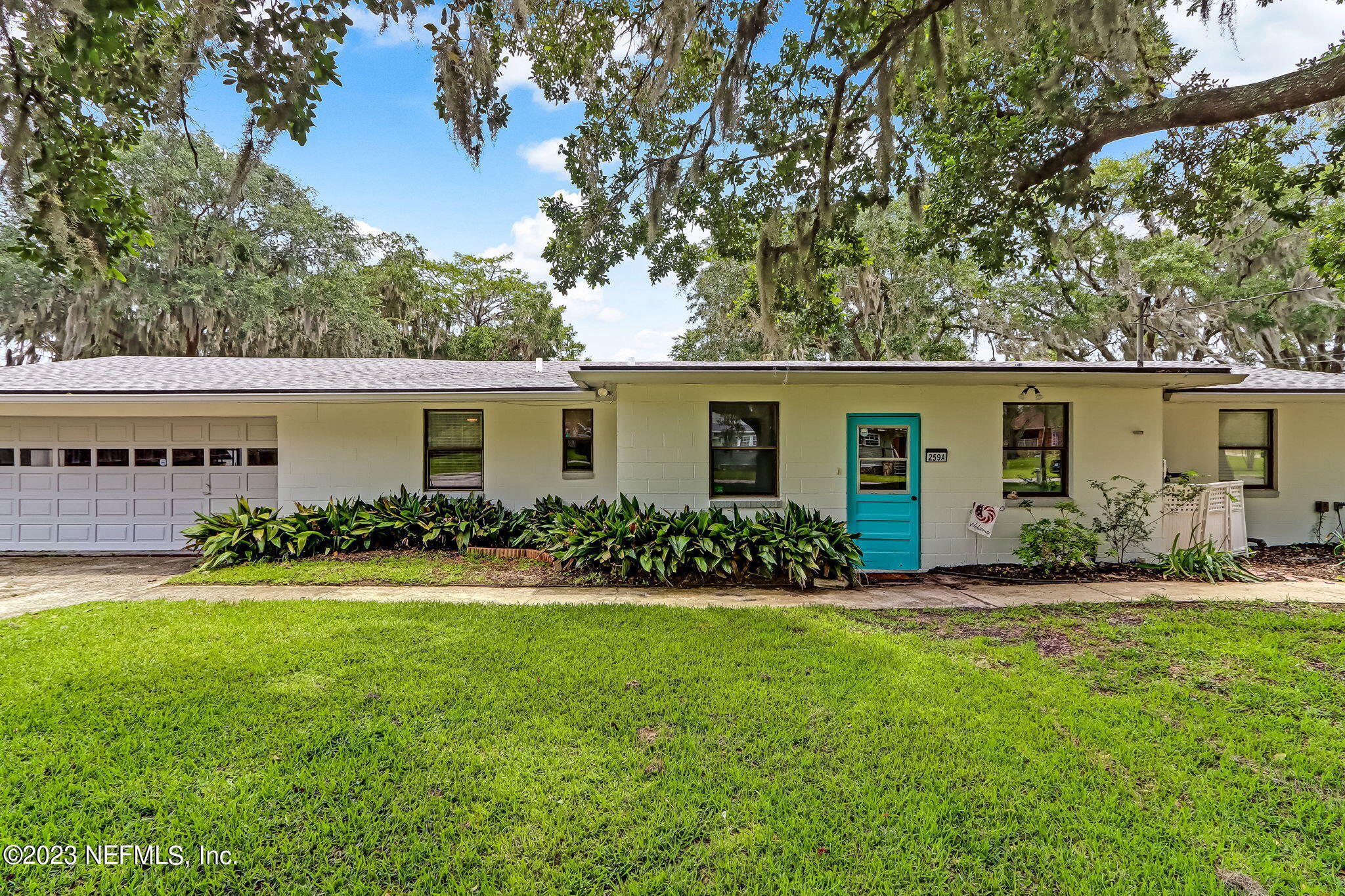 259 Brickyard Road, Unit B Middleburg, FL 32068 - Photo 1 of 53 front view of a house with a yard
