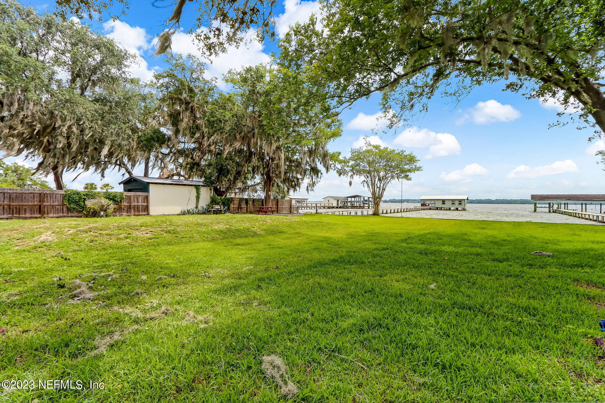 259 Brickyard Road, Unit B Middleburg, FL 32068 - Photo 21 of 53 a view of yard with green space and trees