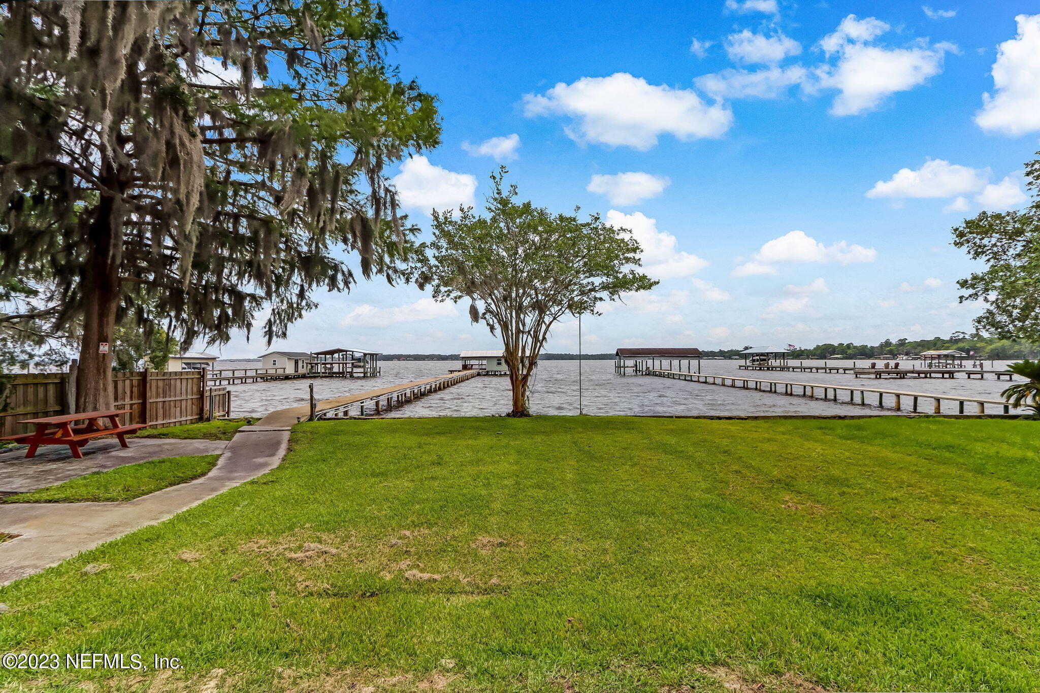 259 Brickyard Road, Unit B Middleburg, FL 32068 - Photo 23 of 53 a view of a golf course with a lake view