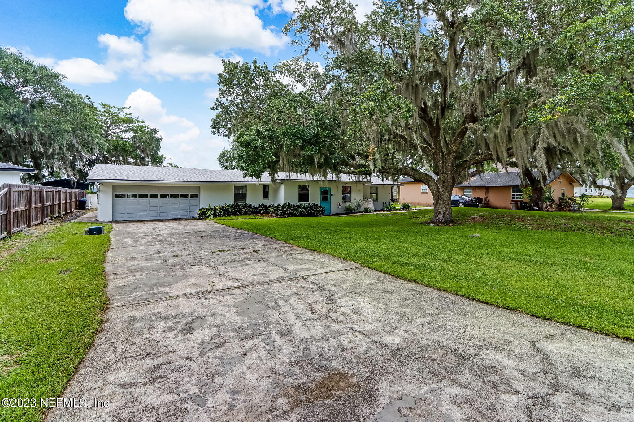 259 Brickyard Road, Unit B Middleburg, FL 32068 - Photo 3 of 53 a view of a yard with plants and trees