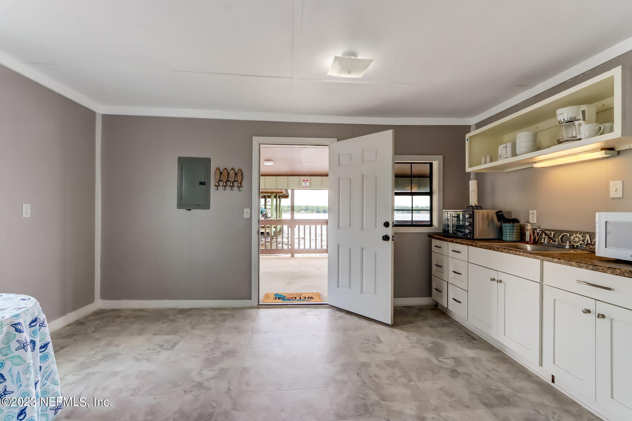 259 Brickyard Road, Unit B Middleburg, FL 32068 - Photo 35 of 53 a large kitchen with a sink