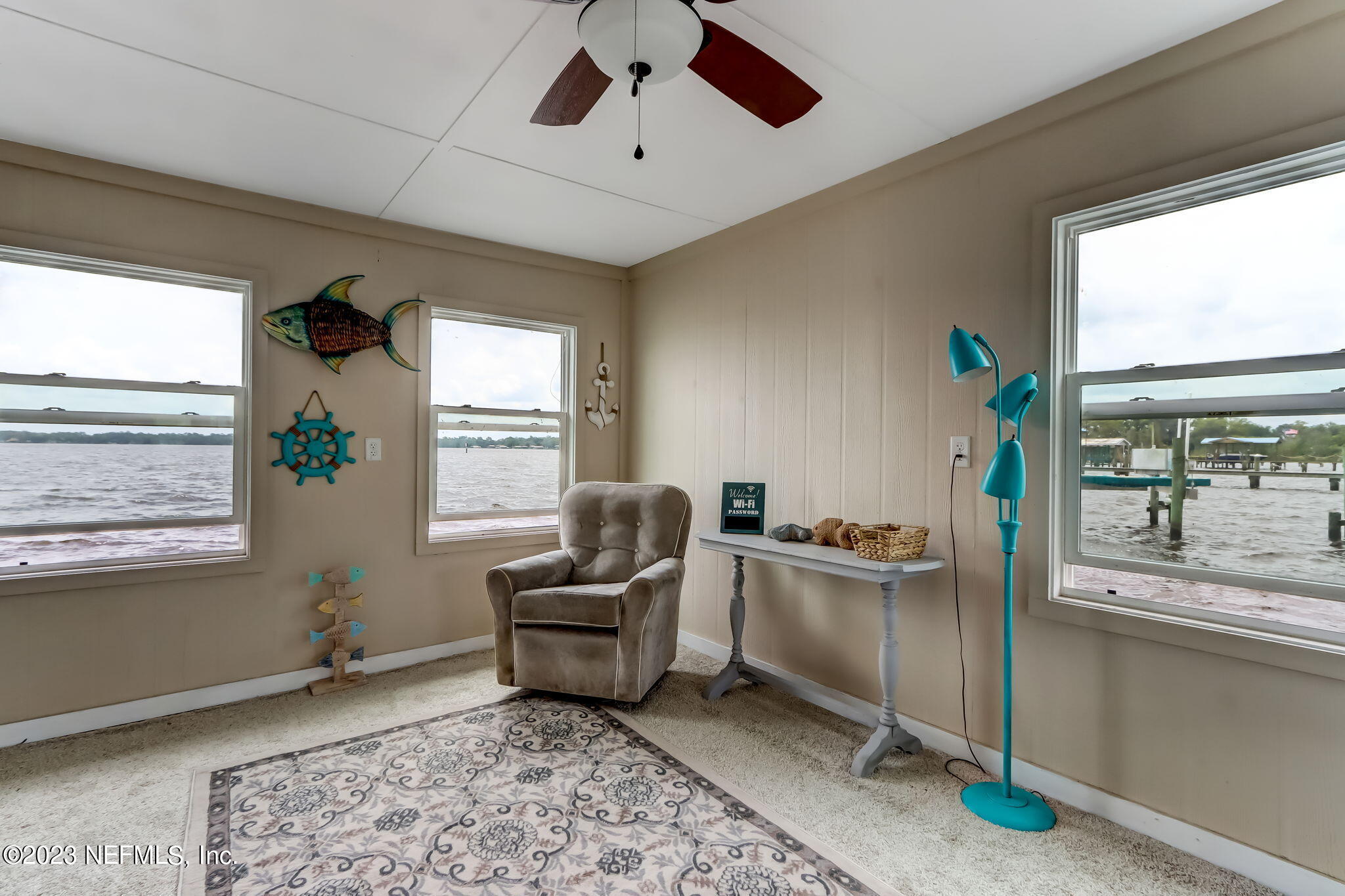 259 Brickyard Road, Unit B Middleburg, FL 32068 - Photo 41 of 53 a living room with furniture and a window