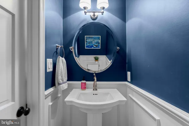 a bedroom with a bed and a tv